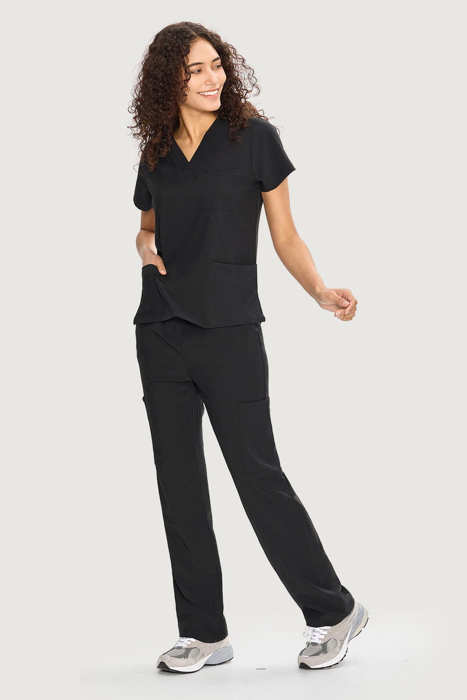 Woman wearing COZYFIT medical scrubs