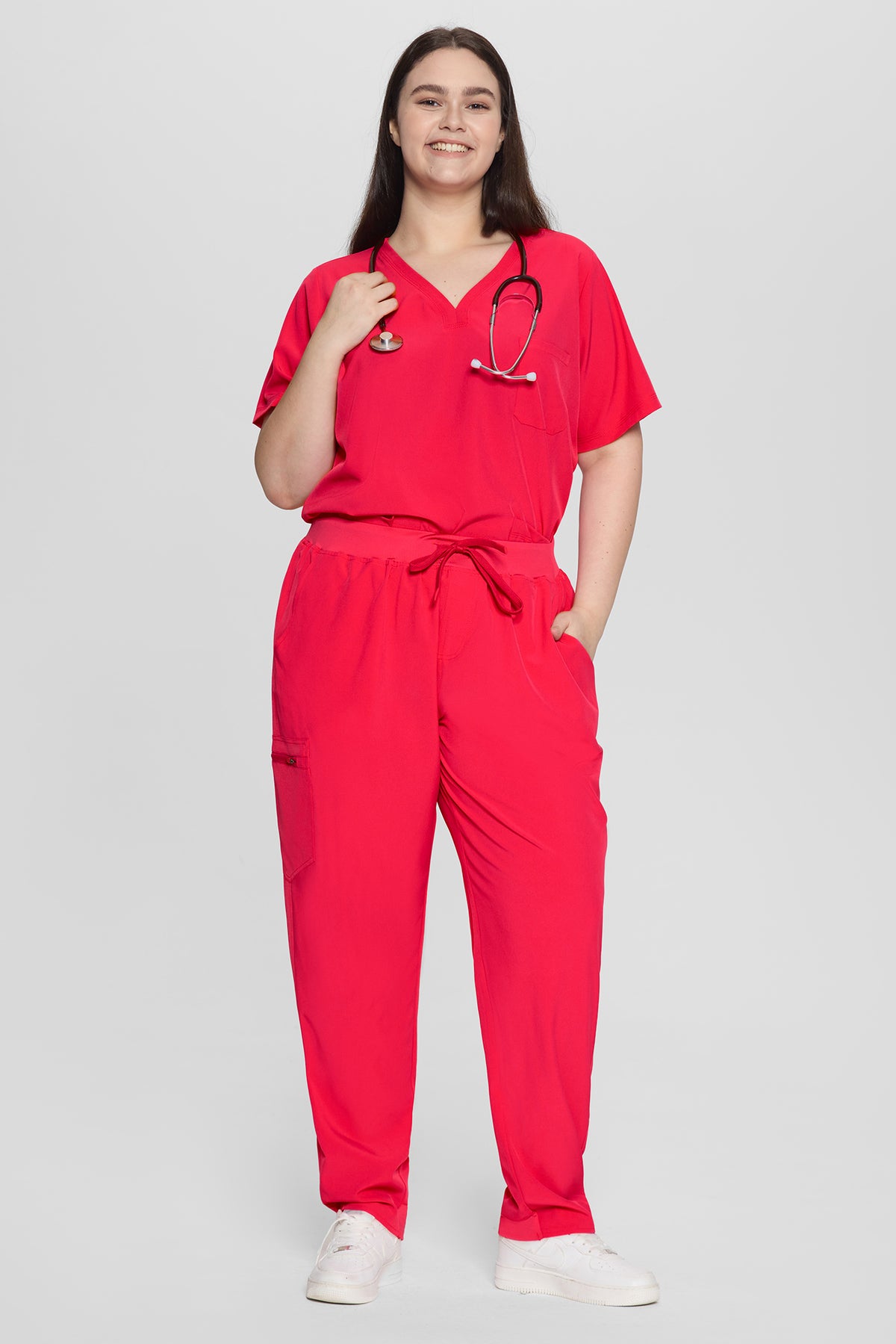 Women's Curved V-Neck 8-Pocket Jogger Scrub Set, Viva Magenta, Model Front View