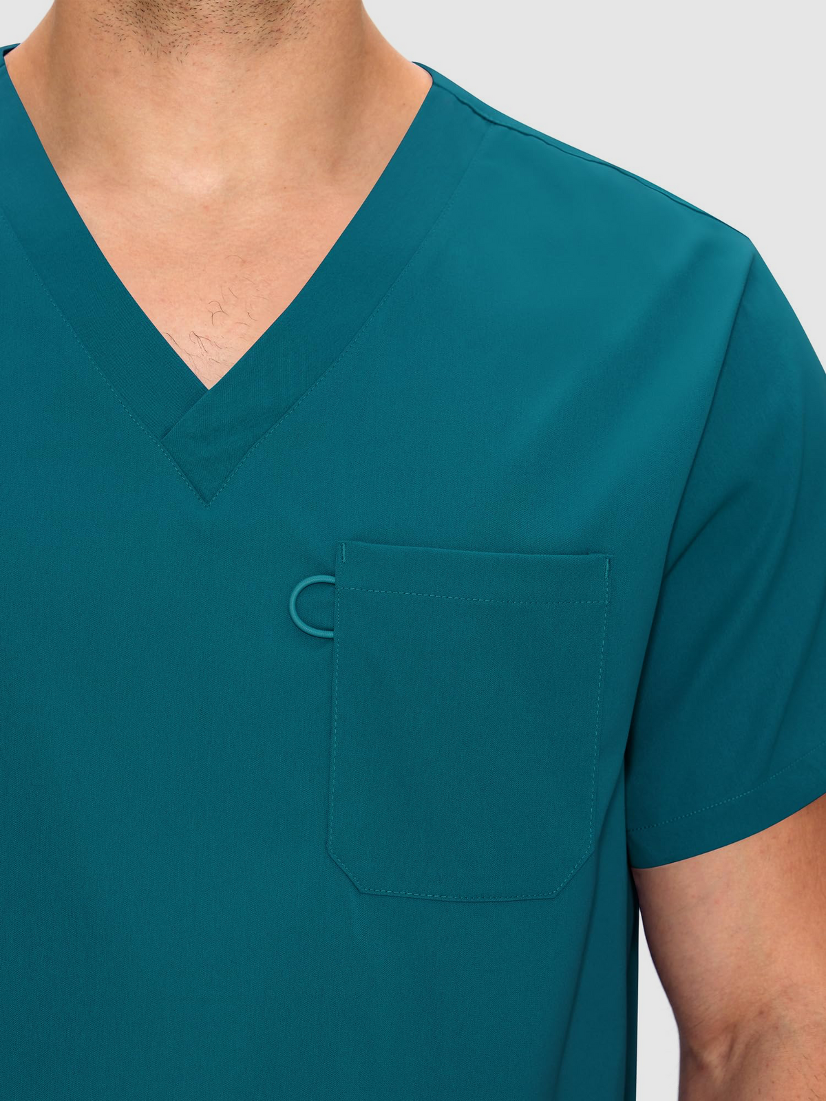 Orion V-Neck Scrub Top, Caribbean Blue, V-Neck and Chest Pocket Detail