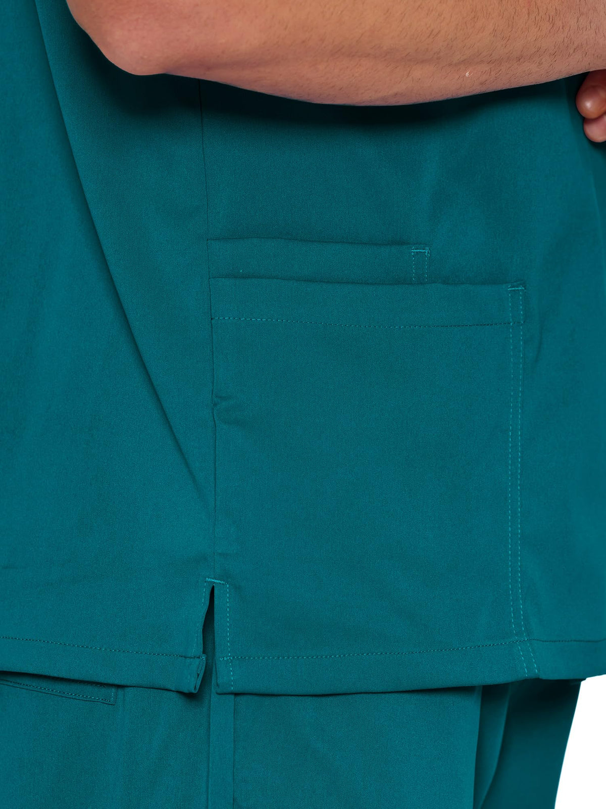 Orion V-Neck Scrub Top, Caribbean Blue, Side Hem Slit Detail